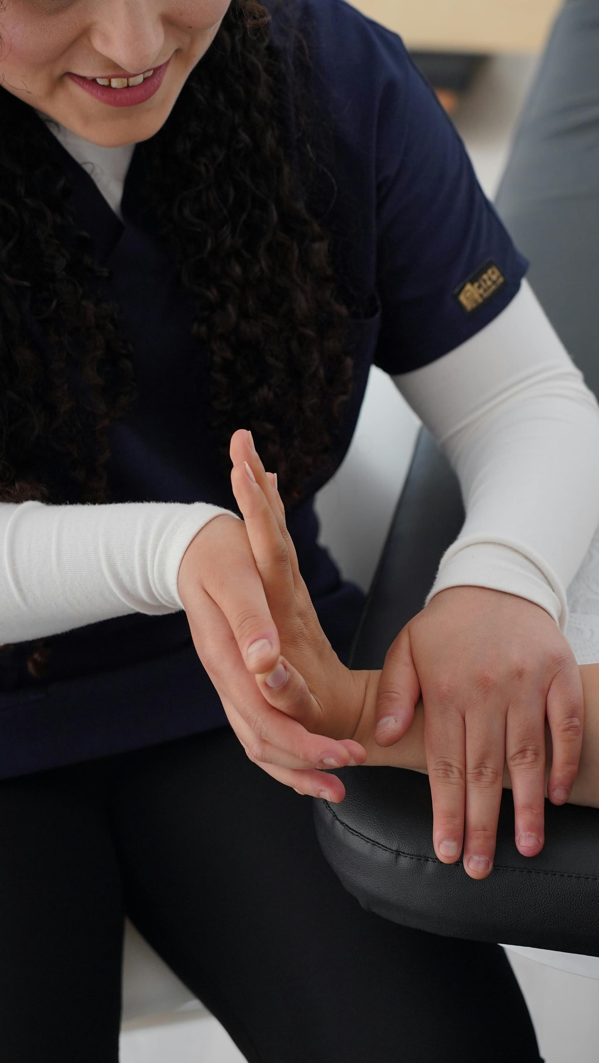 Physiotherapist providing hands-on treatment