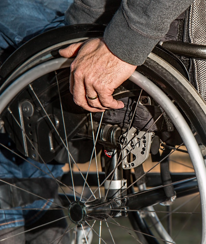 physical therapist with patient stretching